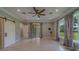 Living room featuring tile floors, recessed lighting, a ceiling fan, and glass sliding doors at 4004 Se 47Th Pl, Ocala, FL 34480