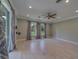 Living room with hardwood-style floors, recessed lighting, a ceiling fan, and natural light at 4004 Se 47Th Pl, Ocala, FL 34480