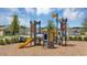 Community playground with a yellow slide and castle design at 4723 Golden Knight Blvd, Kissimmee, FL 34746