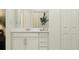 Bright bathroom vanity with modern fixtures, cabinetry, and plenty of counter space at 4838 Waltham Forest Dr, Davenport, FL 33837