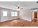 Spacious living room with hardwood floors, fan, and natural light at 1123 Enchanted Dr, Lakeland, FL 33801