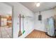 Functional utility room with storage solutions, including shelving and utility hooks at 1123 Enchanted Dr, Lakeland, FL 33801