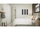 Bright bedroom featuring skateboard art, modern decor, and large bed at 1393 Acorn Meadow Loop, Eustis, FL 32726