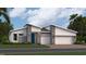 Charming single-story home with a two-car garage, stone accents, and well-manicured lawn at 2275 Rider Rain Ln, Apopka, FL 32703