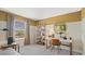 Bedroom features a desk area and neutral decor at 2301 White Buffalo St, Apopka, FL 32703