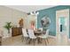 Bright dining area with modern lighting and stylish decor at 2301 White Buffalo St, Apopka, FL 32703