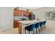 Modern kitchen with stainless steel appliances, island with sink and seating at 2301 White Buffalo St, Apopka, FL 32703