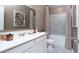 Bright bathroom with white vanity, modern fixtures, and a shower-tub combination at 2329 White Buffalo St, Apopka, FL 32703