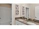 Well-lit bathroom featuring double sinks and a shower-tub combo at 2853 Haze Rd, Clermont, FL 34714