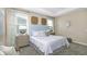 Serene bedroom with soft lighting, a plush bed, and stylish decor at 2853 Haze Rd, Clermont, FL 34714