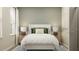 Serene bedroom with a plush bed, stylish bedside lamps, and a calming color palette at 2899 Transformation Way, Clermont, FL 34714