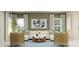 Inviting living room with a comfortable sofa, modern art, large windows, and stylish décor at 2899 Transformation Way, Clermont, FL 34714