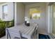 Cozy screened patio with table seating, perfect for outdoor dining at 3001 Namaste Dr, Clermont, FL 34714