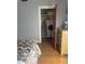 Bedroom view of closet, open door, and dresser at 149 County Road 640, Lake Wales, FL 33859