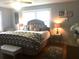 Comfortable bedroom with elegant decor, bedside tables and lots of natural light at 149 County Road 640, Lake Wales, FL 33859