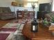 Inviting living room with rich wood floors, neutral walls, and comfortable furnishings at 149 County Road 640, Lake Wales, FL 33859