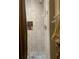 A tiled shower stall with shower head and built in toiletries niche at 149 County Road 640, Lake Wales, FL 33859