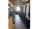 Unfinished storage room with exposed ceiling and shelving, offering potential for customization at 149 County Road 640, Lake Wales, FL 33859