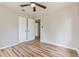 Bedroom with closet and stylish wood-look flooring at 1727 Bonita Ave, Orlando, FL 32805