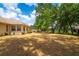 A backyard with mature trees and views of the water at 2214 Deerbrook Dr, Lakeland, FL 33811