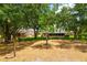Expansive backyard with mature trees and plenty of space for outdoor activities and relaxation at 2214 Deerbrook Dr, Lakeland, FL 33811
