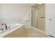 Bathroom showcasing bathtub and shower stall at 2214 Deerbrook Dr, Lakeland, FL 33811