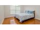 Bedroom featuring a large window and bright, natural light at 2214 Deerbrook Dr, Lakeland, FL 33811