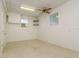 An additional bonus room features two windows, drop ceiling, and a ceiling fan at 2214 Deerbrook Dr, Lakeland, FL 33811