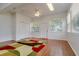 Bright and airy bonus room offers versatile space with a ceiling fan, natural light, and ample room for activities at 2214 Deerbrook Dr, Lakeland, FL 33811