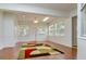 Versatile bonus room offering natural light and ample space, ideal for customization and entertainment at 2214 Deerbrook Dr, Lakeland, FL 33811