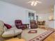 Bright and airy living room open to the dining area and sliding glass doors at 2214 Deerbrook Dr, Lakeland, FL 33811