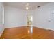 Spacious main bedroom with hardwood floors and an ensuite bathroom at 2214 Deerbrook Dr, Lakeland, FL 33811