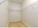 Walk-in closet with shelving and ample storage space at 2214 Deerbrook Dr, Lakeland, FL 33811