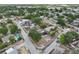 Neighborhood aerial view includes home, landscaping, and proximity to local amenities, with diverse home styles at 503 Holt Cir, Winter Haven, FL 33880