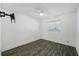 Spacious bedroom with hardwood flooring and a ceiling fan with light at 503 Holt Cir, Winter Haven, FL 33880