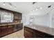Kitchen with granite countertops, stainless steel appliances and access to the breakfast nook at 503 Holt Cir, Winter Haven, FL 33880