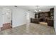 Open concept kitchen features stainless steel appliances, tile floors and granite countertops at 503 Holt Cir, Winter Haven, FL 33880