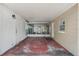 Spacious screened-in patio with doors and ample room for seating and outdoor enjoyment at 503 Holt Cir, Winter Haven, FL 33880