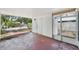 Covered outdoor patio featuring ample space, access door, and a view of the property at 503 Holt Cir, Winter Haven, FL 33880