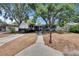 Charming home with mature trees and long driveway with RV parking in front yard at 750 Azalea Dr, Bartow, FL 33830