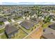 Aerial view of a residential community featuring well-maintained lawns, and neighborhood streets at 921 Fieldstone Way, Haines City, FL 33844