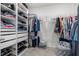 Spacious walk-in closet with custom shelving and ample storage space at 921 Fieldstone Way, Haines City, FL 33844