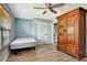 Bedroom featuring natural light from window and ample closet space at 781 Little Pine Dr, South Daytona, FL 32119