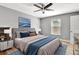 Cozy bedroom featuring a plush bed, stylish decor, and a bright window at 781 Little Pine Dr, South Daytona, FL 32119