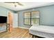 Bright bedroom with hardwood floors, closet and large window for great natural light at 781 Little Pine Dr, South Daytona, FL 32119