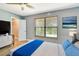 Serene bedroom with a soft bed, large window, and stylish furnishings at 781 Little Pine Dr, South Daytona, FL 32119