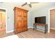 Bedroom featuring a closet, tv, and a window for natural light at 781 Little Pine Dr, South Daytona, FL 32119