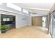 Bright sunroom with sliding glass doors and tile floor leading to the backyard at 781 Little Pine Dr, South Daytona, FL 32119