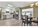 Updated kitchen featuring stainless steel appliances, stone countertops, and a breakfast nook at 781 Little Pine Dr, South Daytona, FL 32119