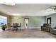 Spacious living room featuring wood flooring, neutral tones, and lots of natural light at 781 Little Pine Dr, South Daytona, FL 32119